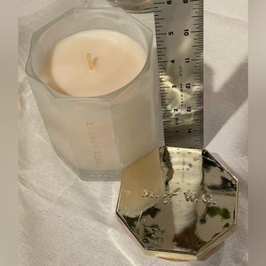 Holiday scent of Silver Birchwood in decorative reusable glass.